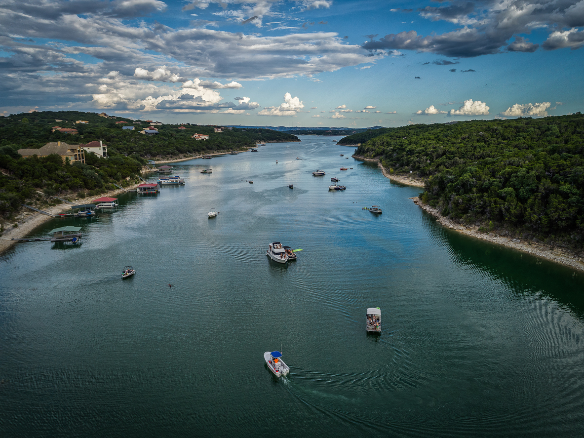 Aerial photo taken over a cove in Austin, Texas featuring boats