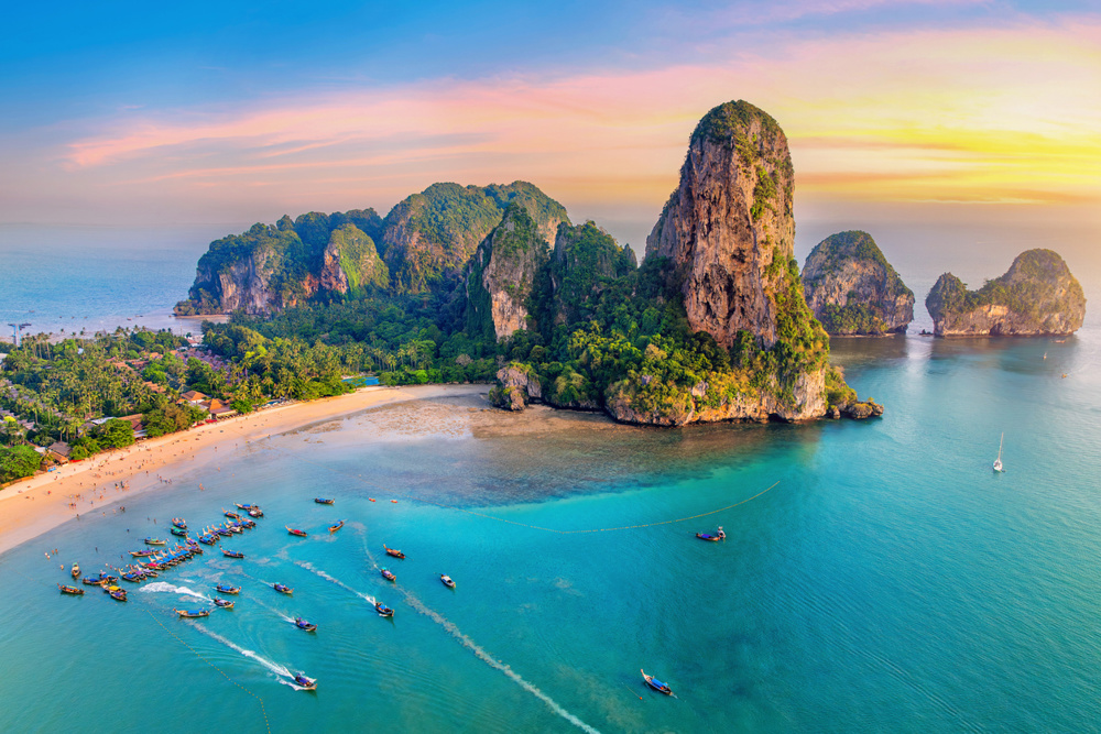 Railay beach with long tail boat in Krabi, Thailand