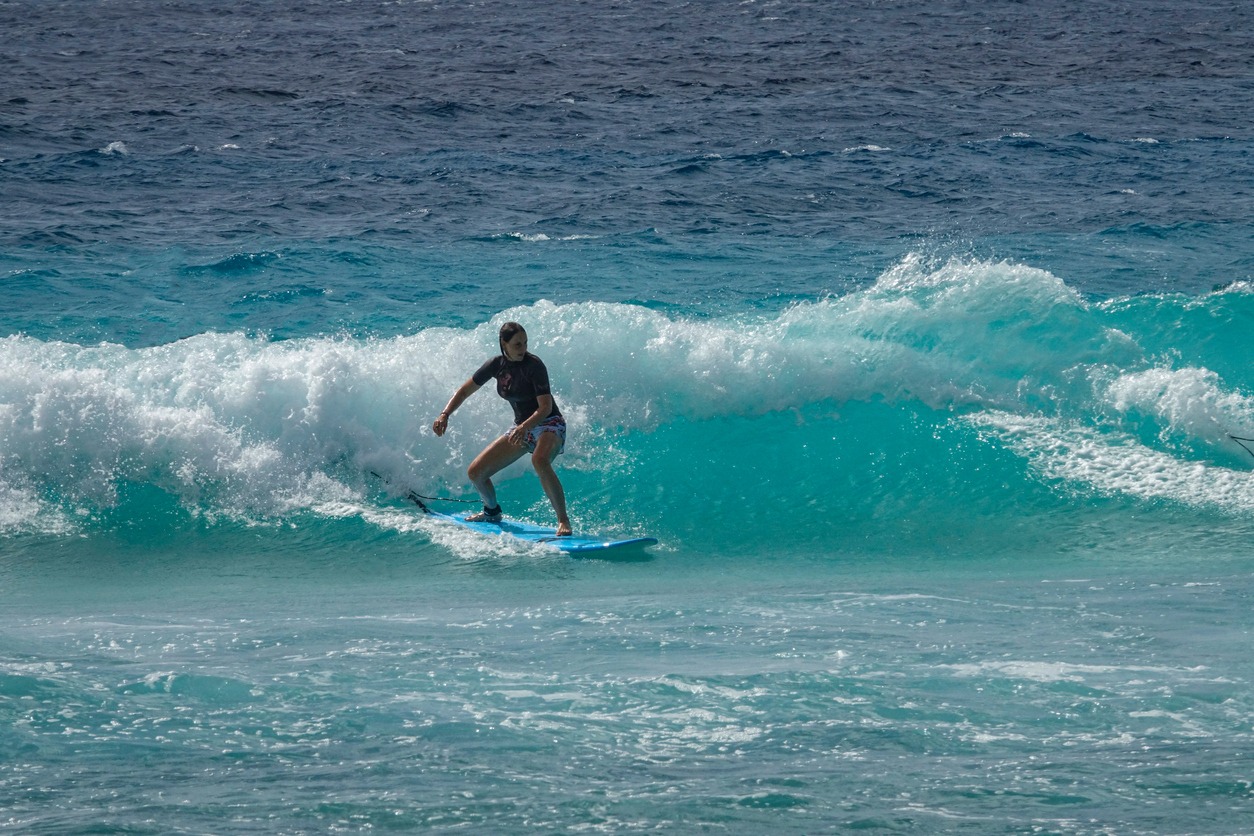 Woman on a cool surfing trip