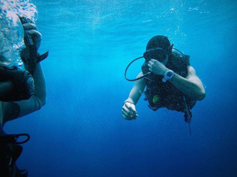 two people snorkeling