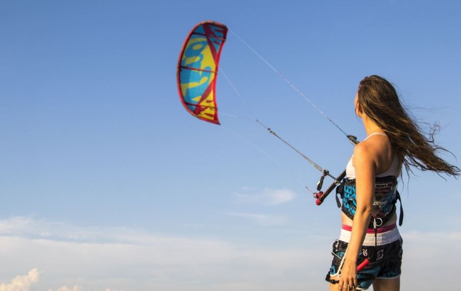 A kitesurfer wearing a harness